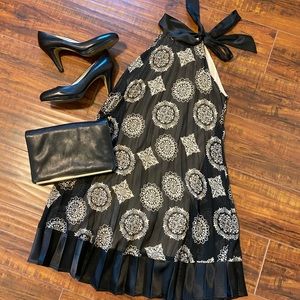 Black pleated dress with mehndi-like print